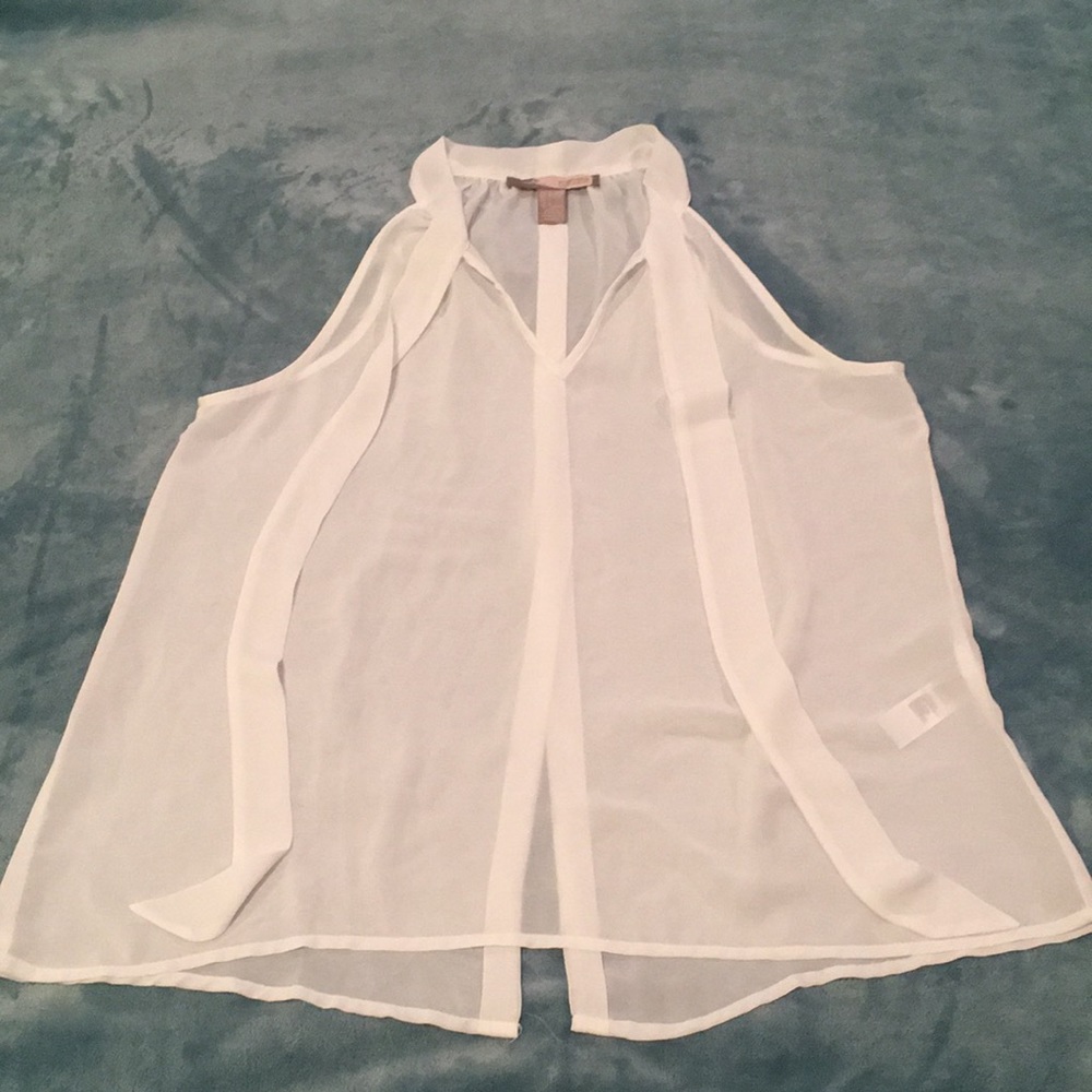 White sleeveless blouse